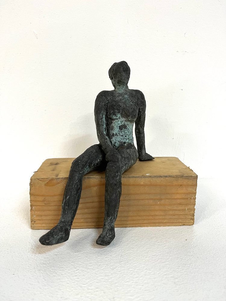 Mid-Century bronze sculpture of seated woman 1960s