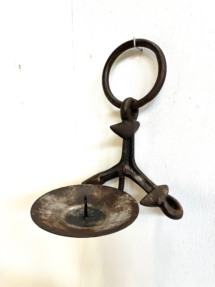 Brutalist cast rusty iron wall-mounted candle holder 1970s