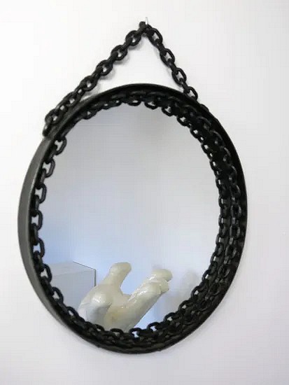 Round brutalist mirror with solid steel chain
