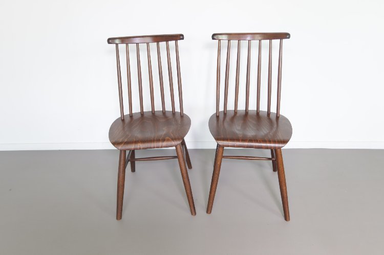 20th Century wooden spindle back dining chairs by ilmari Tapiovaara 1960s