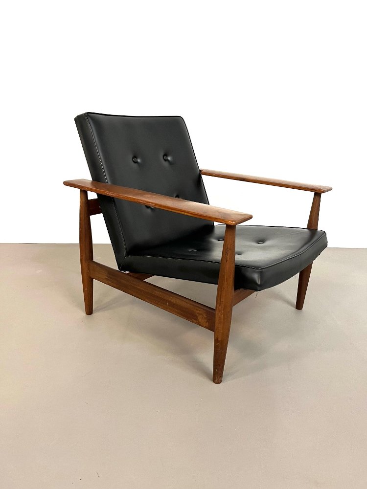 Mid-Century Danish teak armchair with black skai upholstery 1960s